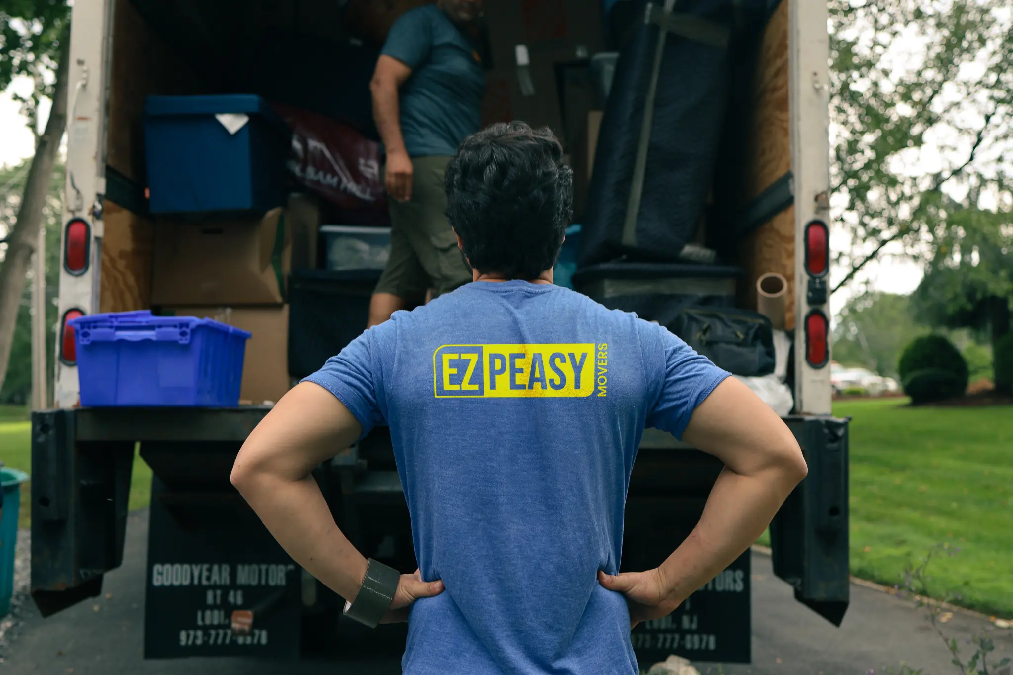 Ez Peasy Movers team loading a truck
